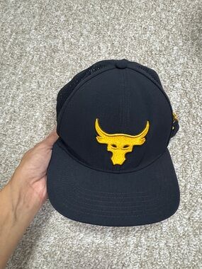 Under Armour Black Trucker Hat with Yellow Bull Logo